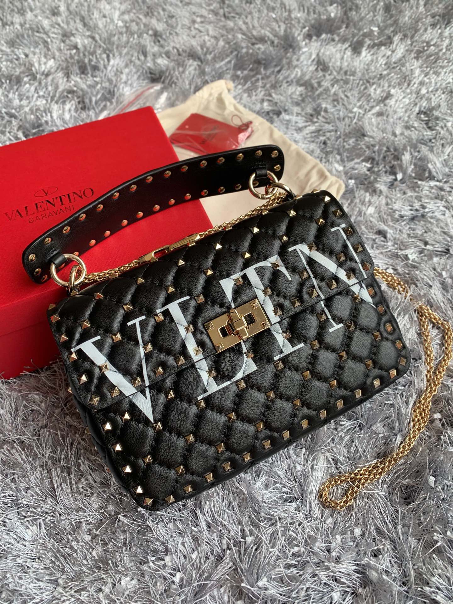 Valentino Garavani Rockstud Spike Medium Chain Bag in Black Supple Lambskin Nappa